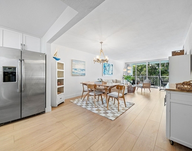 621 E Woolbright Road - Photo Thumbnail 3