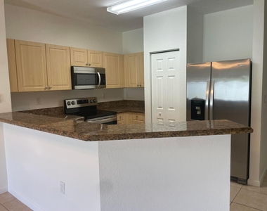 5187 Se Mariner Garden Circle - Photo Thumbnail 3