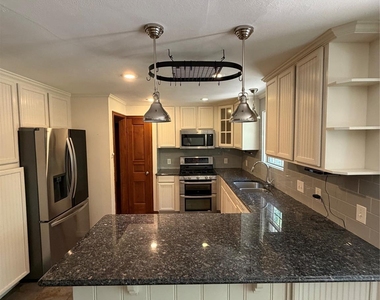 6452 E Lovers Lane - Photo Thumbnail 2