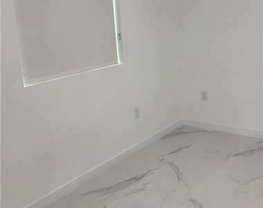 1155 E 81st Street - Photo Thumbnail 8