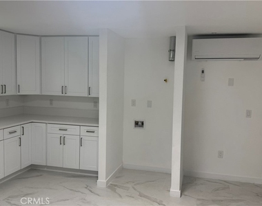 1155 E 81st Street - Photo Thumbnail 1