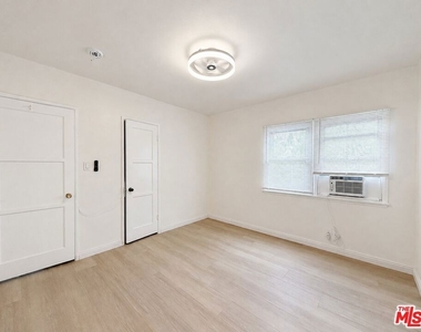 10616 Wilkins Avenue - Photo Thumbnail 2