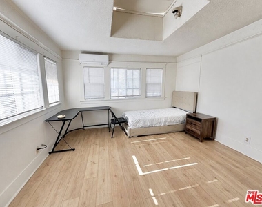 1188 W 37th Drive - Photo Thumbnail 1