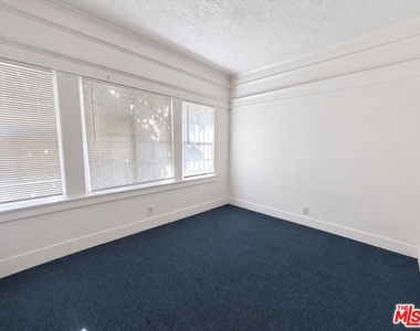 1188 W 37th Drive - Photo Thumbnail 6