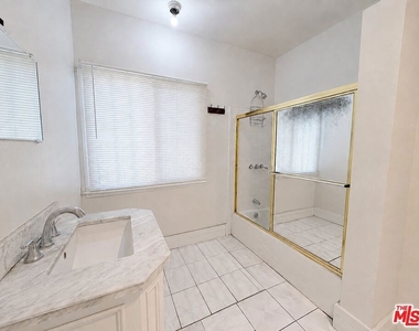 1188 W 37th Drive - Photo Thumbnail 2