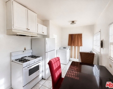 1188 W 37th Drive - Photo Thumbnail 5