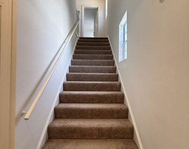 1249 S Tremaine Avenue - Photo Thumbnail 4