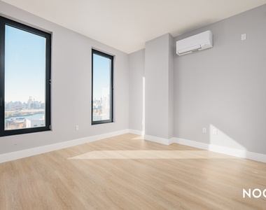 26-25 4th St - Photo Thumbnail 3