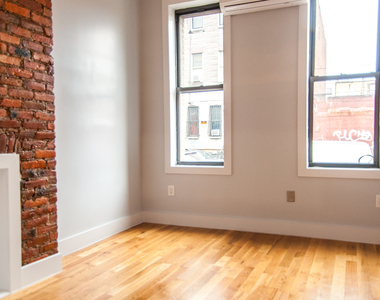 1128 Willoughby Ave - Photo Thumbnail 1