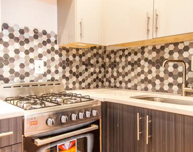 1128 Willoughby Ave - Photo Thumbnail 6