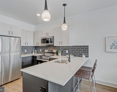 5001 Umbria Street - Photo Thumbnail 2