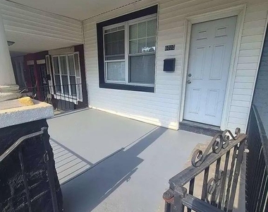 6010 N Lambert Street - Photo Thumbnail 1