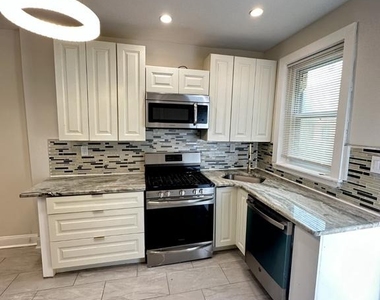 6010 N Lambert Street - Photo Thumbnail 6