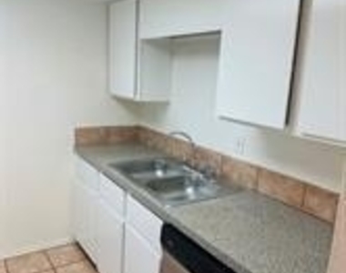 2401 Leon St - Photo Thumbnail 5
