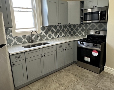 1522 E 71st Place - Photo Thumbnail 8