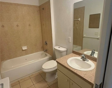 1002 W 12th Street - Photo Thumbnail 6