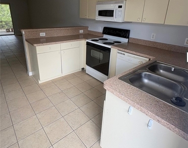 1002 W 12th Street - Photo Thumbnail 1