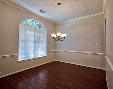 6715 Village Bridge Drive - Photo Thumbnail 2