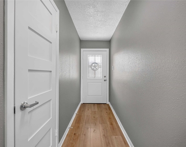 2702 Sicklepod Drive - Photo Thumbnail 2