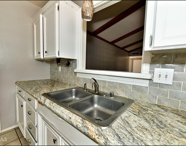 9125 W H Burges Drive - Photo Thumbnail 17