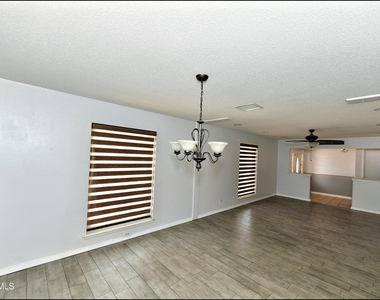 9125 W H Burges Drive - Photo Thumbnail 12
