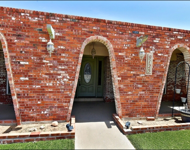 9125 W H Burges Drive - Photo Thumbnail 4