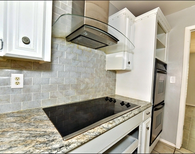 9125 W H Burges Drive - Photo Thumbnail 18