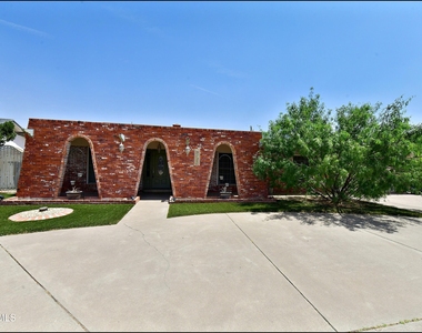 9125 W H Burges Drive - Photo Thumbnail 2