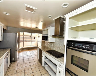 9125 W H Burges Drive - Photo Thumbnail 14
