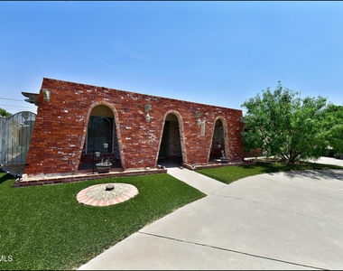 9125 W H Burges Drive - Photo Thumbnail 1