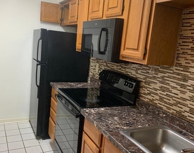 8545 Midpark Road - Photo Thumbnail 4