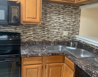 8545 Midpark Road - Photo Thumbnail 7