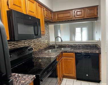 8545 Midpark Road - Photo Thumbnail 5