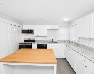 1701 Brook Hollow Drive - Photo Thumbnail 9