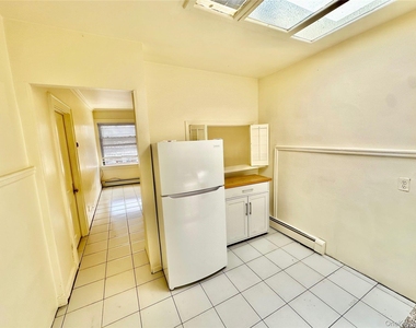918 Hempstead Turnpike - Photo Thumbnail 3