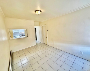 918 Hempstead Turnpike - Photo Thumbnail 5