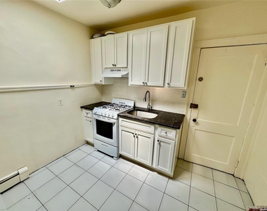 918 Hempstead Turnpike - Photo Thumbnail 1
