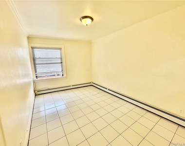 918 Hempstead Turnpike - Photo Thumbnail 7