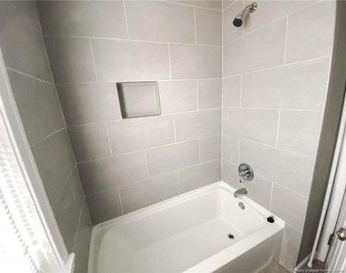 210 E 16th Street - Photo Thumbnail 10