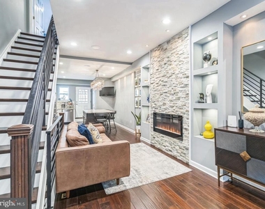 1153 N Hancock Street - Photo Thumbnail 1