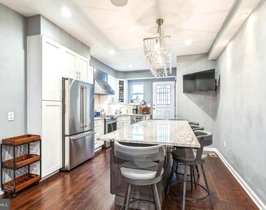 1153 N Hancock Street - Photo Thumbnail 5