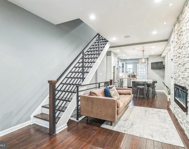1153 N Hancock Street - Photo Thumbnail 2