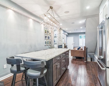 1153 N Hancock Street - Photo Thumbnail 4