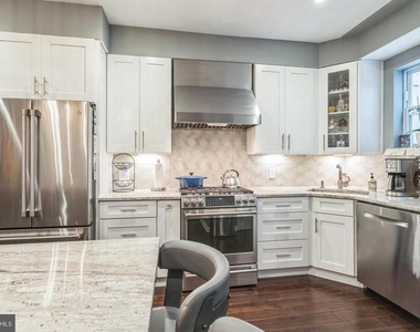 1153 N Hancock Street - Photo Thumbnail 3