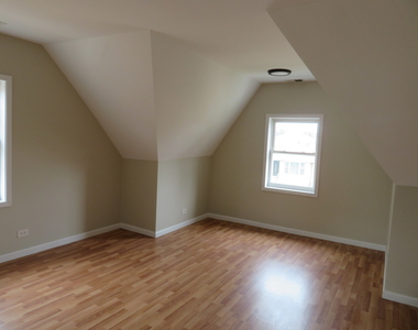 6957 W Fletcher Street - Photo Thumbnail 4
