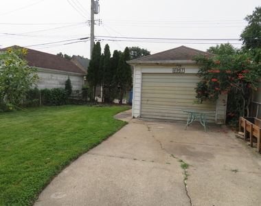6957 W Fletcher Street - Photo Thumbnail 3