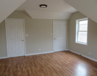 6957 W Fletcher Street - Photo Thumbnail 7