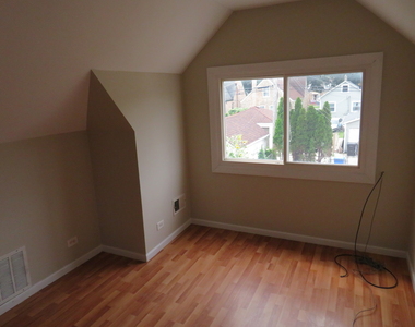 6957 W Fletcher Street - Photo Thumbnail 11