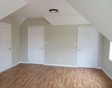 6957 W Fletcher Street - Photo Thumbnail 6