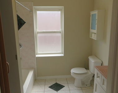 6957 W Fletcher Street - Photo Thumbnail 10